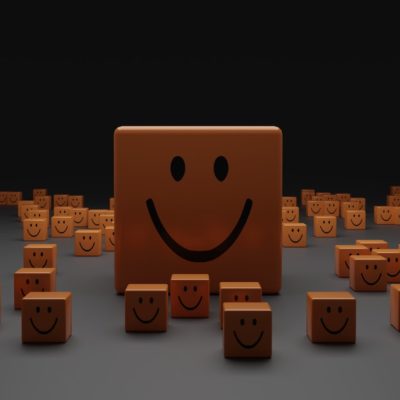 A box with a smiley face is surrounded by much smaller boxes with smiley faces on them.